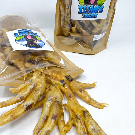 Titan's Treats dehydrated chicken feet dog treats with packages in background